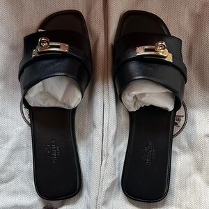 Hermes Giulia Black Leather Sandals with Gold Accent